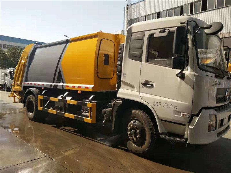 東風天龍后雙橋壓縮垃圾車有效地防止了收集、運輸過程的撒落