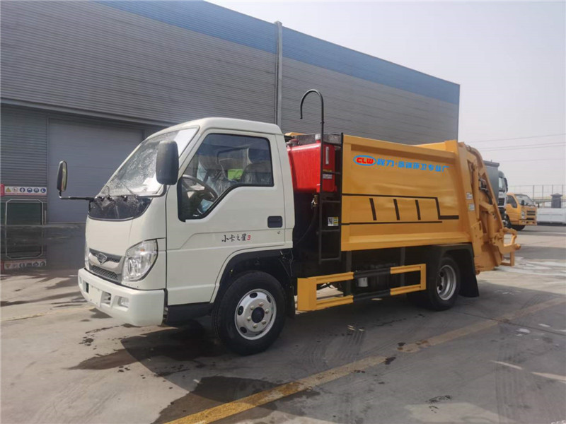 福田小卡之星藍(lán)牌4方壓縮垃圾車(chē)